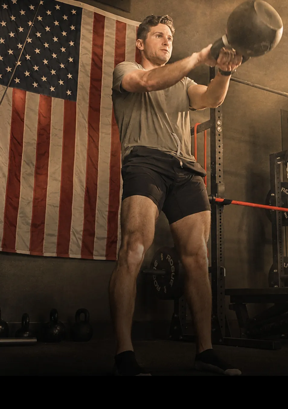 Athlete swinging a kettlebell
