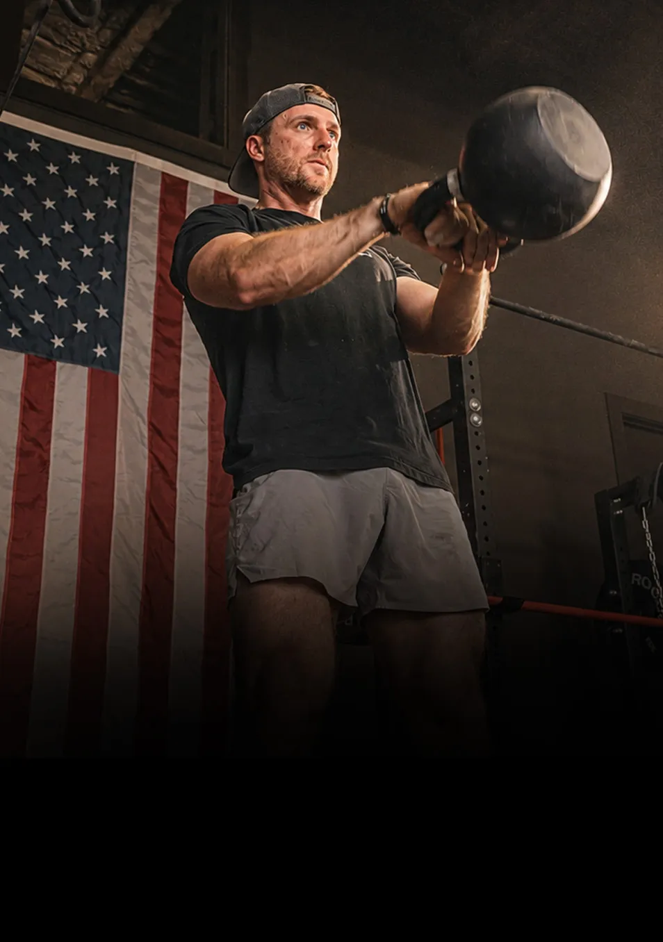 Athlete swinging a kettlebell